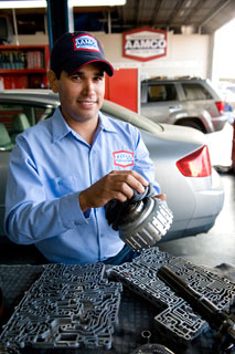 Get the best Clutch Repair Services at AAMCO Image of AAMCO Mechanic Repairing a clutch